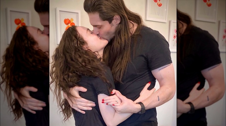 Kat Dennings kissing Andrew W.K.