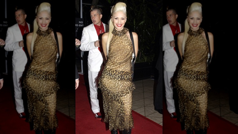 Gwen Stefani on the red carpet and wearing a sheer leopard-print dress