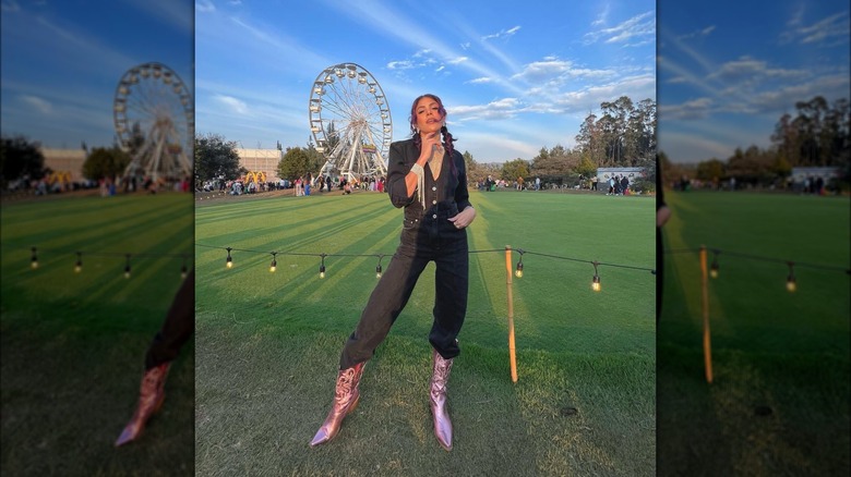 Woman wearing pink cowboy boots