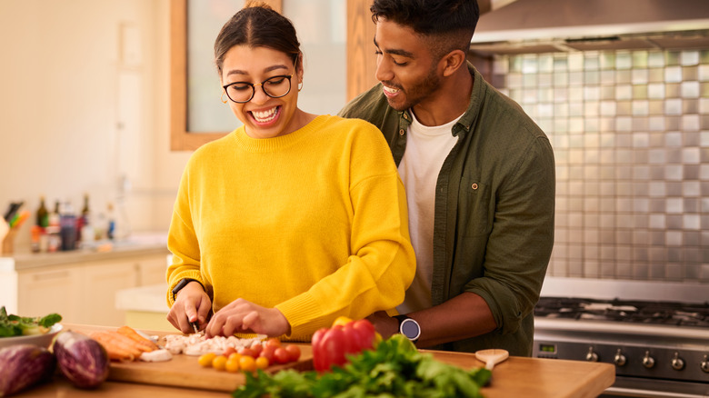 Couple making dinner