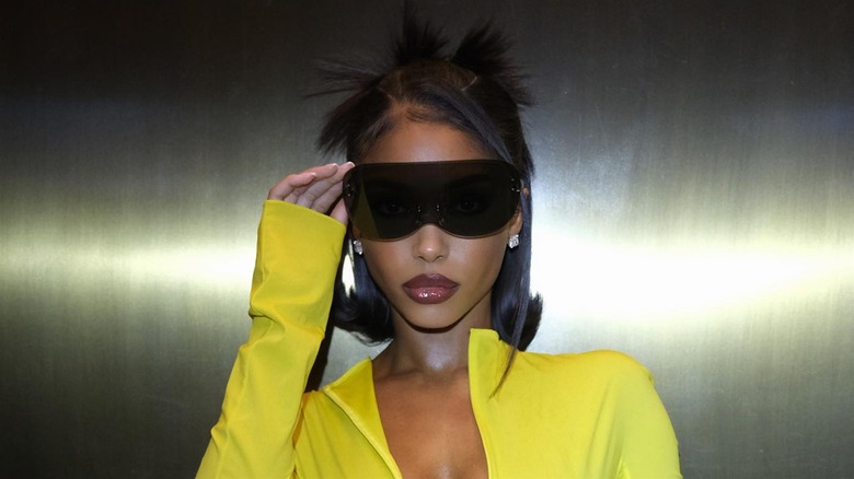 Lori Harvey with a bell-bottom bob