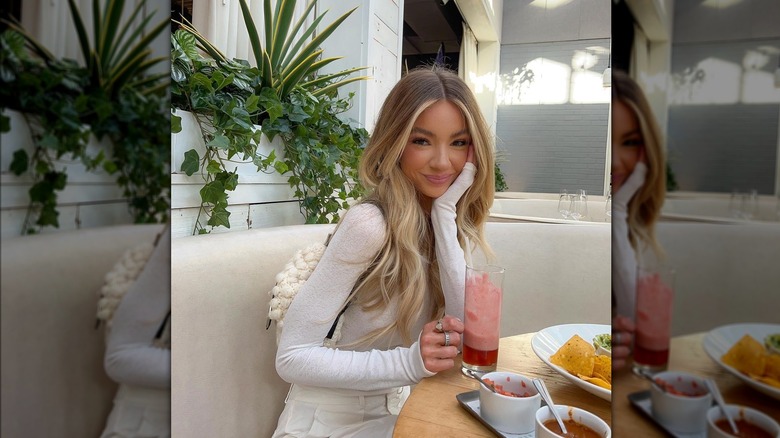 Woman with curtain bangs