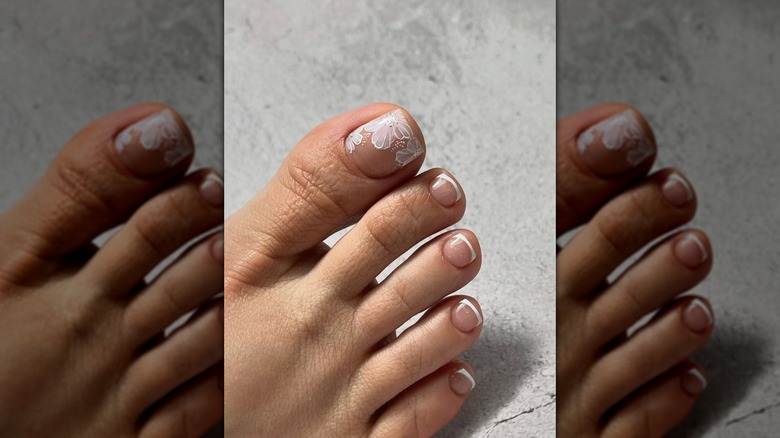 French and lace design white pedicure