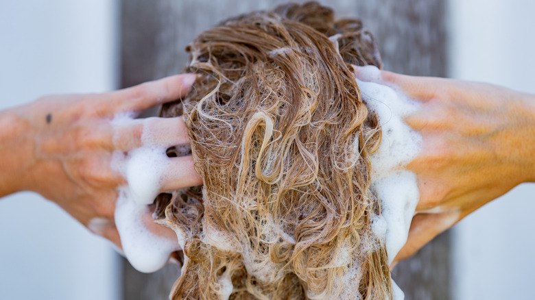 Person washing their hair