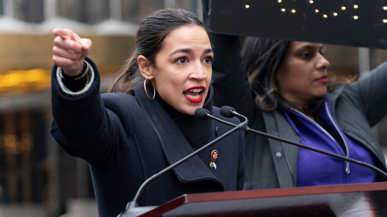 Alexandria Ocasio-Cortez speaking and pointing