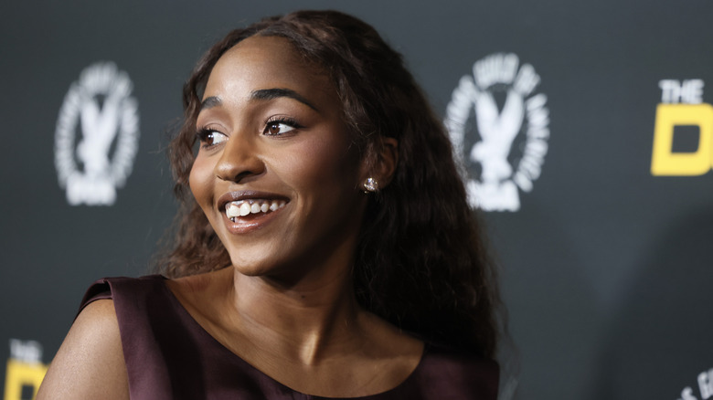 Ayo Edebiri poses for a photo on the red carpet of the 77th Directors Guild of America Awards