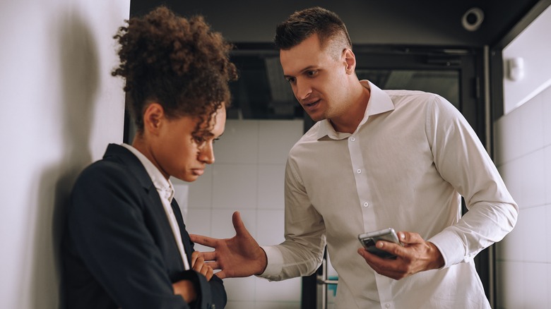 Man looking at a woman