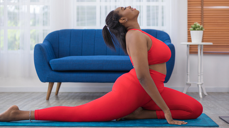 Woman doing yoga at home