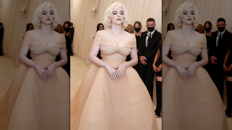 Billie EIlish wearing a large ball gown at the 2021 Met Gala