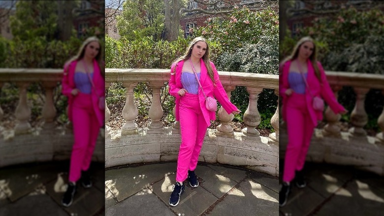 Woman in pink and purple ensemble