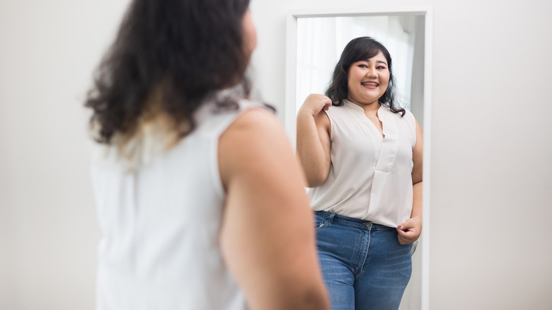 Woman trying on clothes