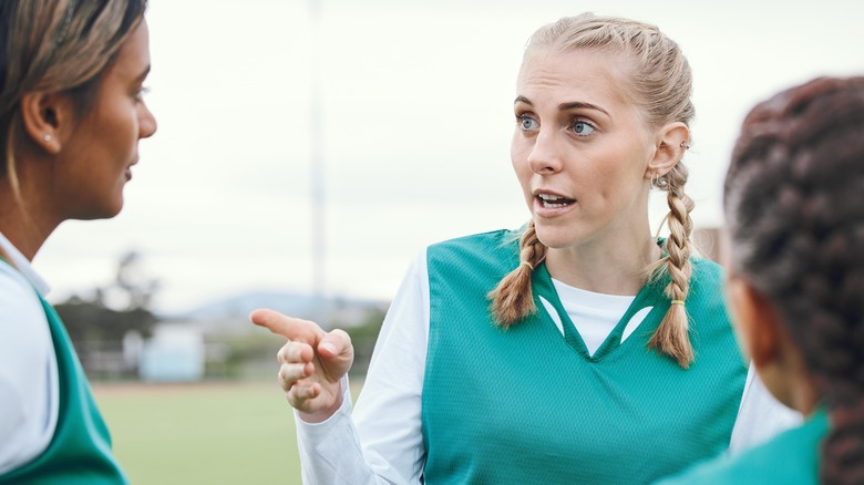 Captain directing teammates