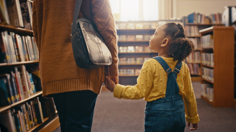Mother, daughter, library