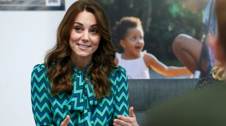 kate middleton wearing a chevron print pussybow blouse in 2020