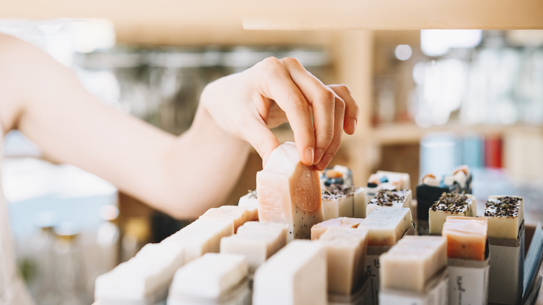 woman selecting soap