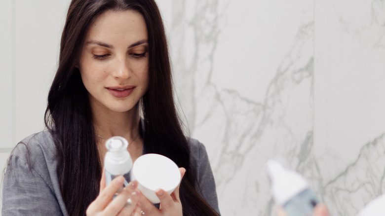 Woman looking at beauty products