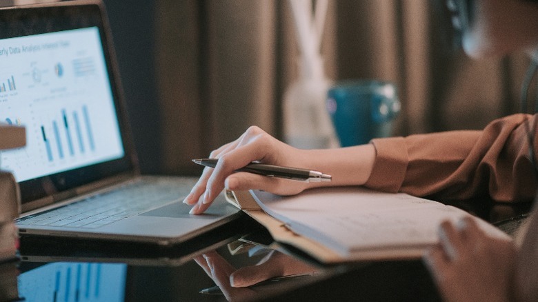 Woman reading report