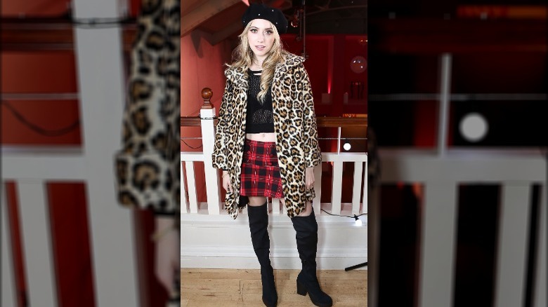 Y2K model wearing many prints