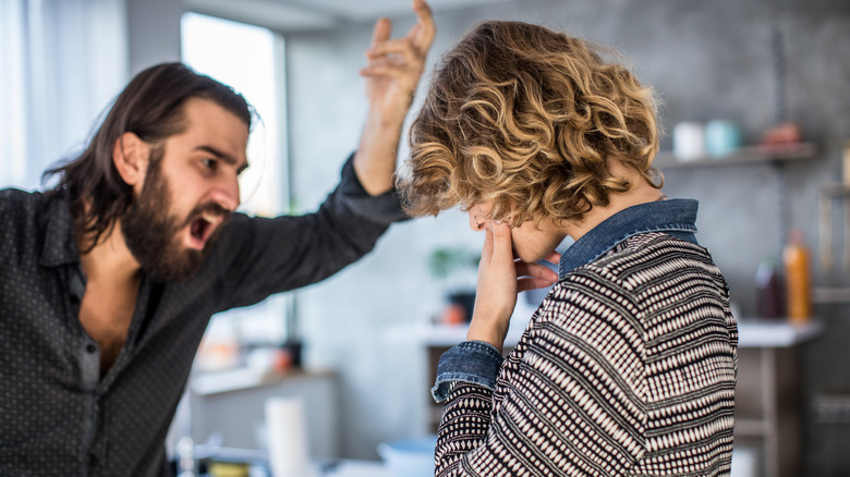 man yelling at woman