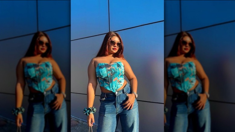 Woman in blue printed corset