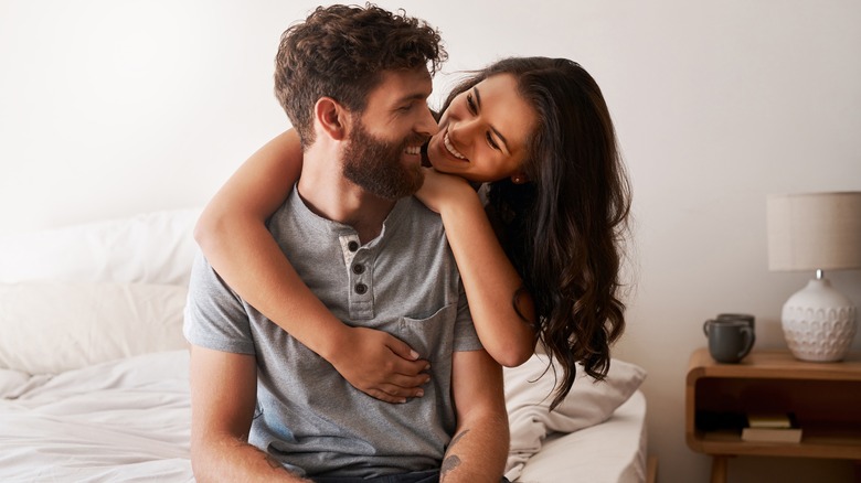 Couple smiling at each other