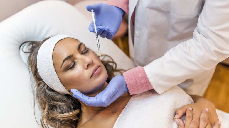 woman gets filler dissolved