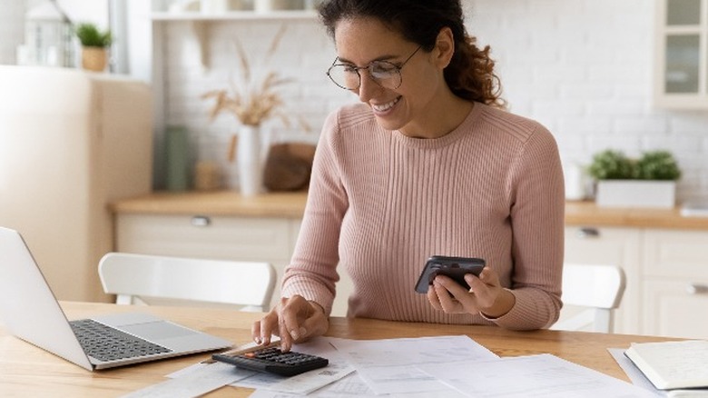 Woman paying bills