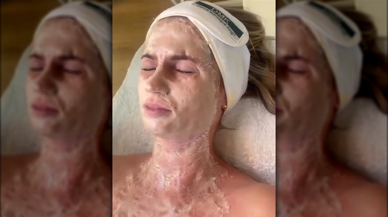 A woman wearing a DMK Enzyme mask