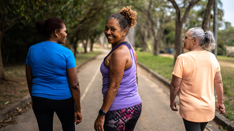 happy women walking together