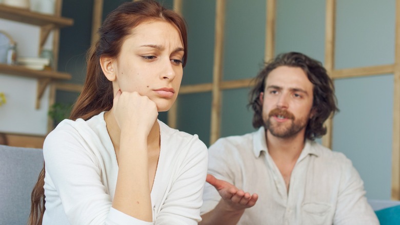 Man speaking to a woman