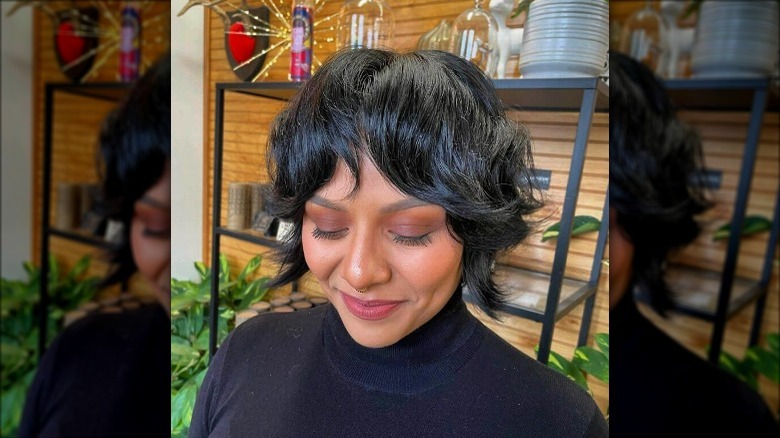 Woman with short hair and bangs