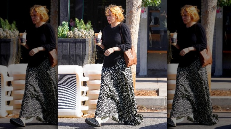 woman in skirt and birkenstocks