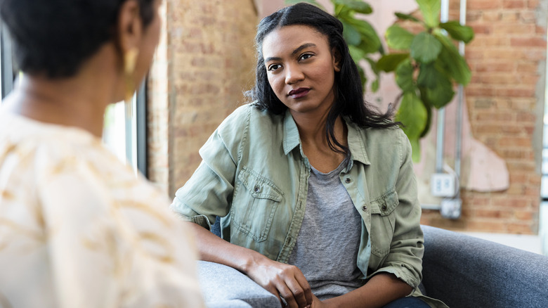 Woman listening to therapist