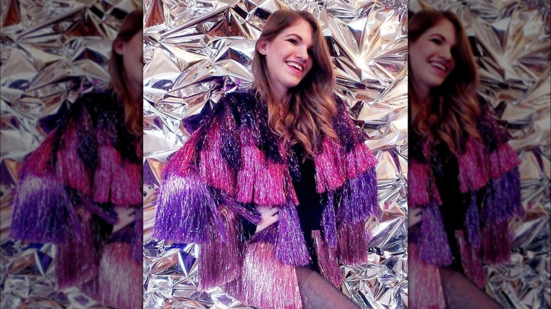 Woman in fringe jacket