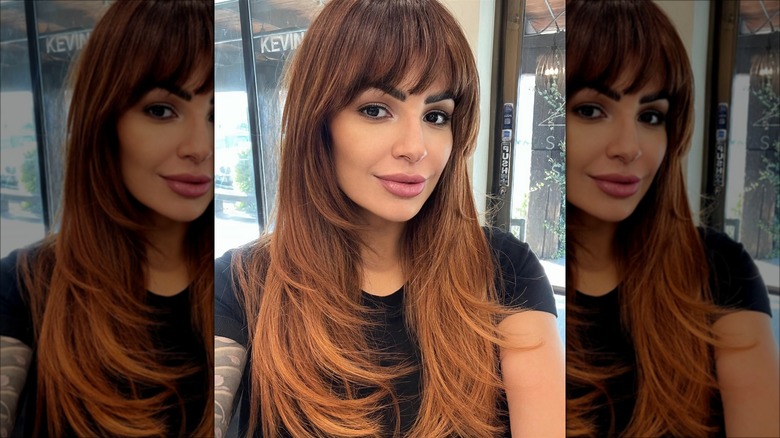 Woman with bangs and layers