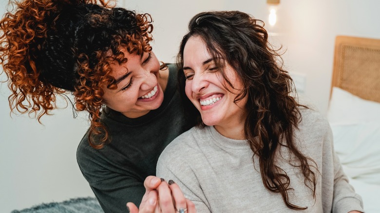 Lesbian couple smiling