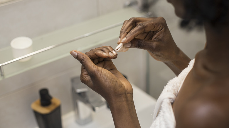 Taking off nail polish 