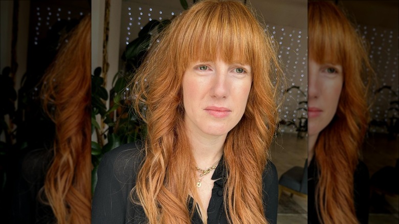 Woman with blunt bangs