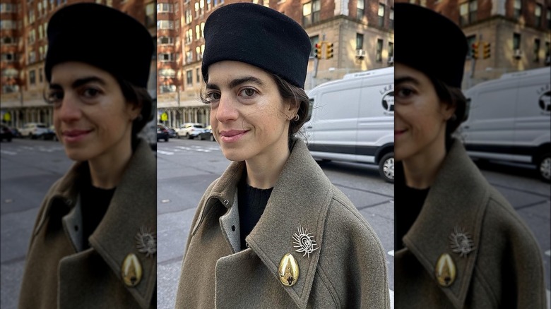 woman wearing brooches