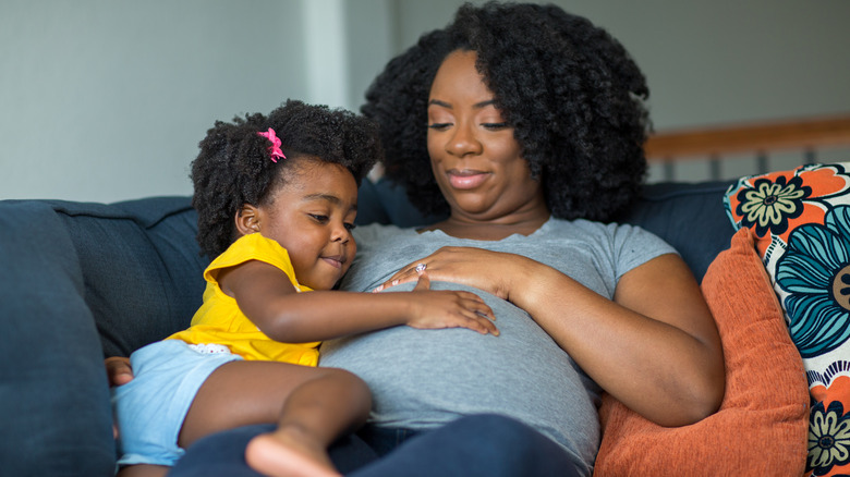 Pregnant mother with toddler