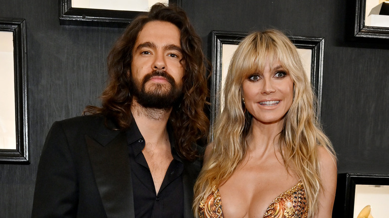 Tom Kaulitz posing with Heidi Klum