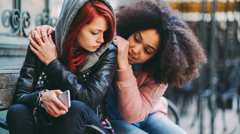 couple comforting each other