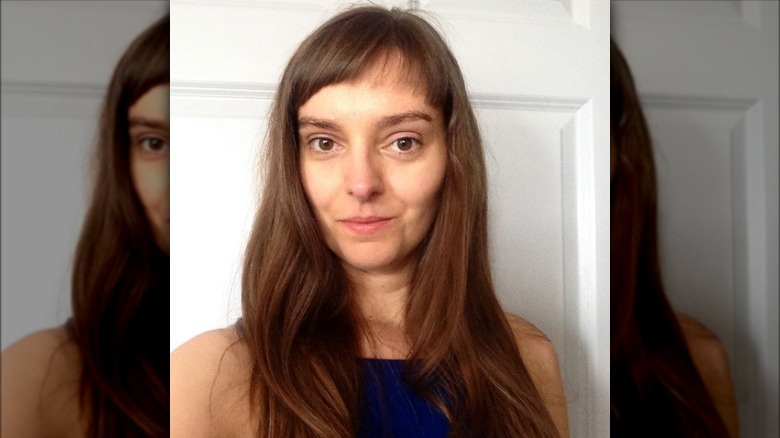 Woman with wispy micro-bangs