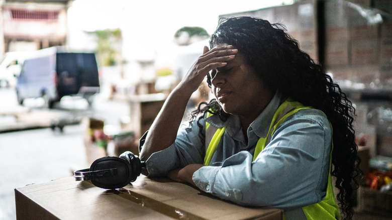 Woman tired at job