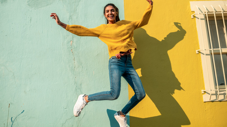 joyous woman jumping 