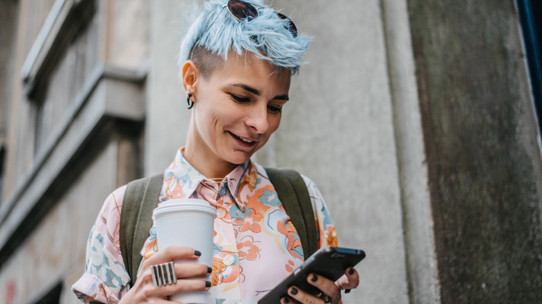 smiling androgynous woman 