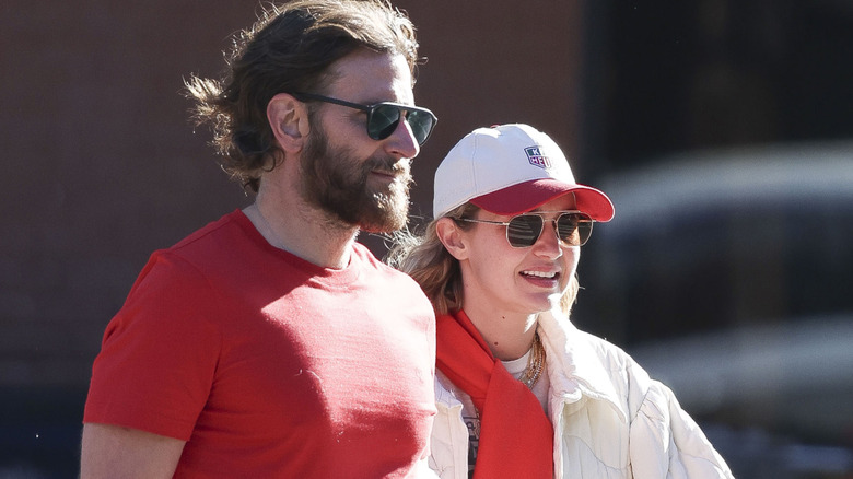 Paparazzi shot of Gigi Hadid and Bradley Cooper getting into a cab