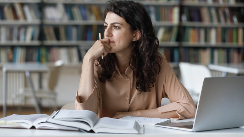 Woman has cramps at work