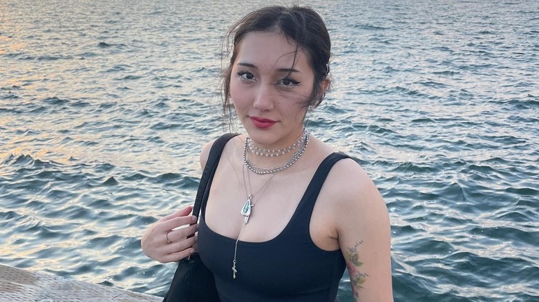 Woman with layered necklaces 