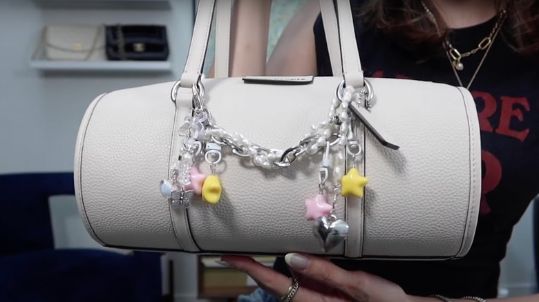 Woman on Instagram charming her bag 